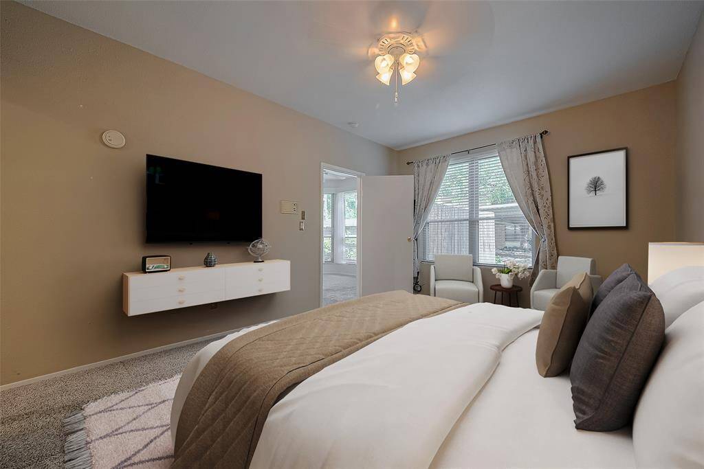 The primary bedroom is conveniently located just steps away fromfering a perfect blend of comfort and accessibility.