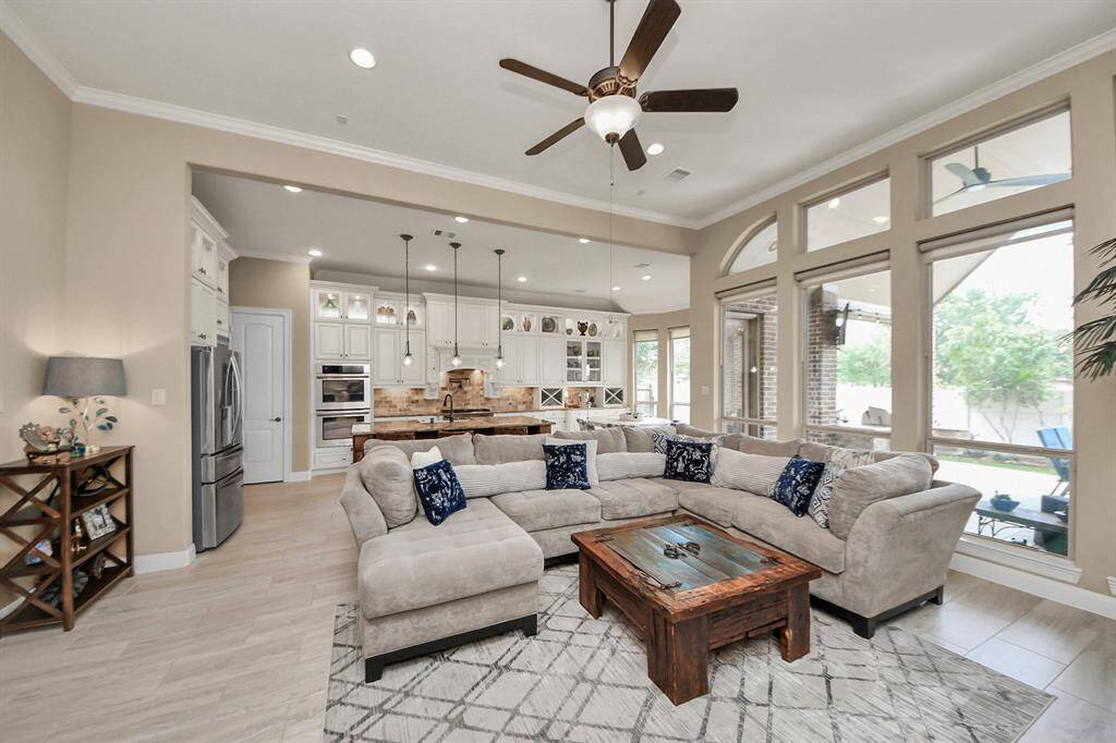 Love the floor to ceiling Windows across the back of the home.