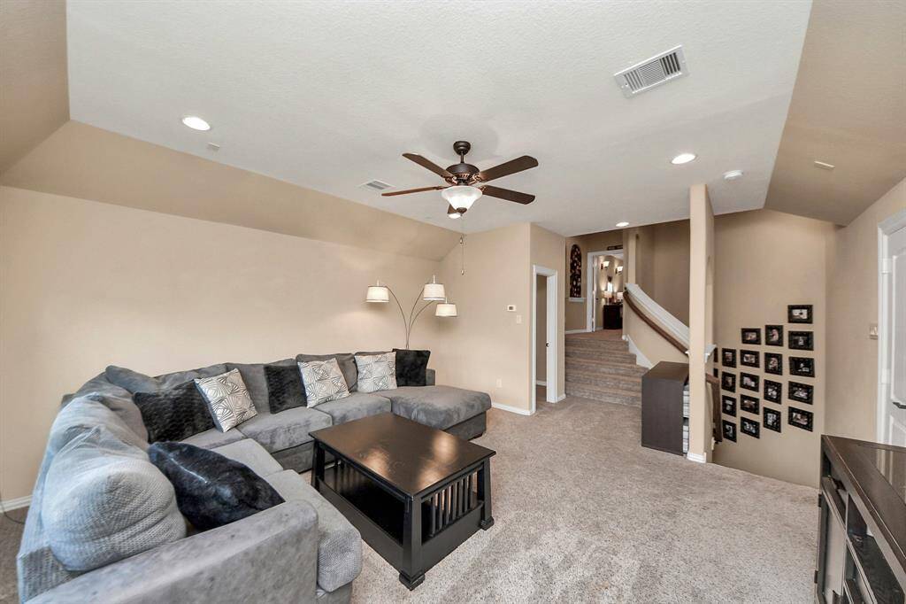 The Upstairs View. Lots of attic storage too! Door on the right at the top of the stairs.