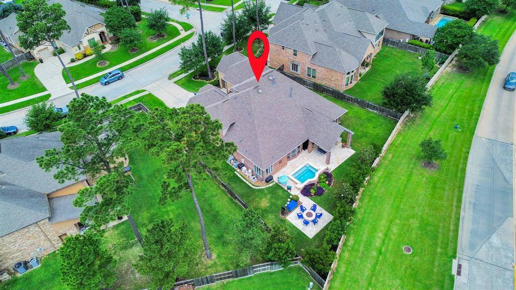Birdseye view from the back. It backs up to Northpointe Ridge Lane. NO BACK NEIGHBORS and very light traffic.