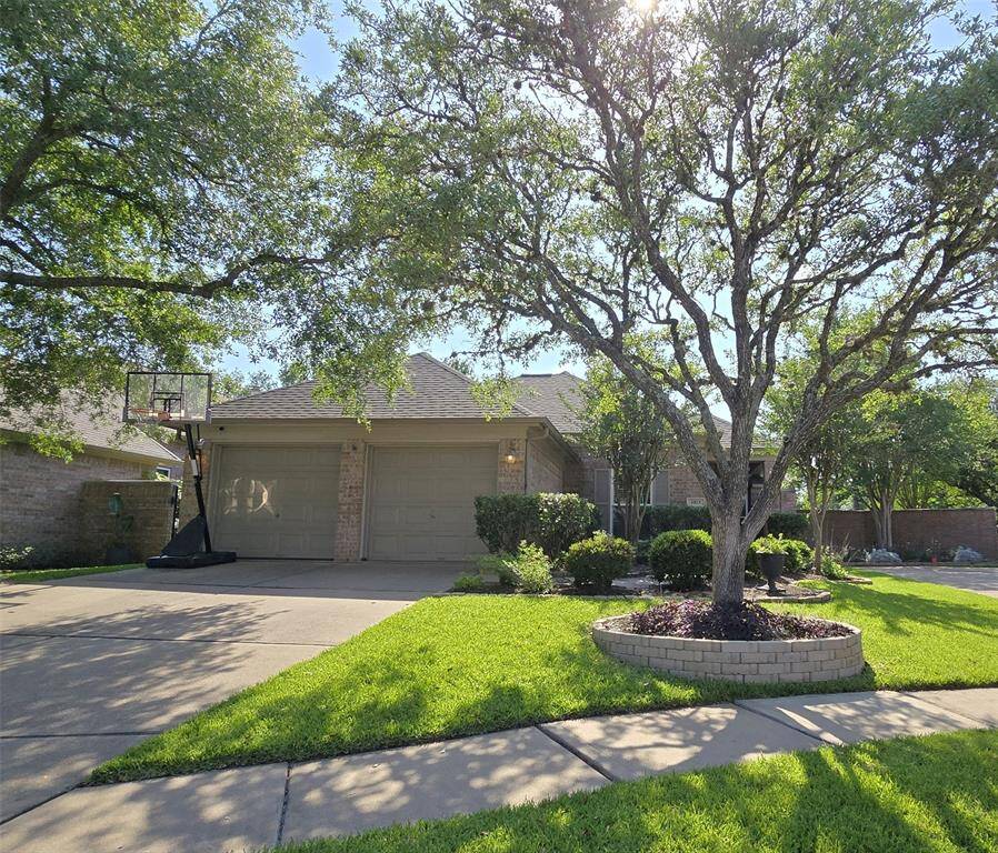 Front View with Gorgeous Landscaping