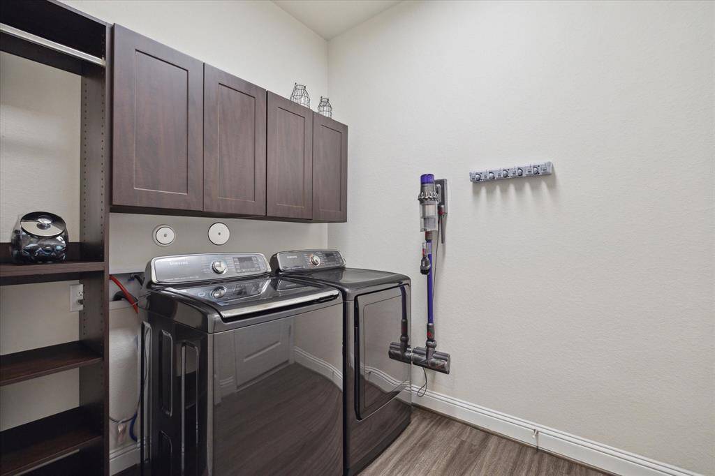 Laundry room located from the 2-car garage.