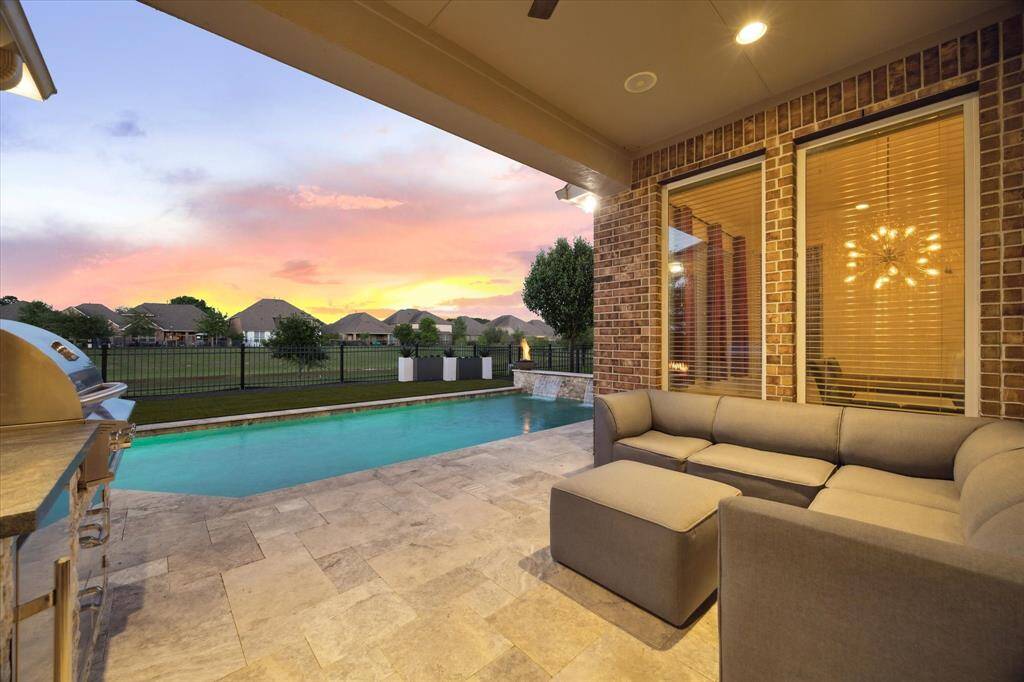 The covered patio is the perfect place to watch the sunset.