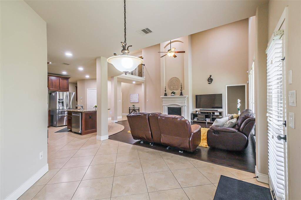 Tile and wood floors downstairs living areas