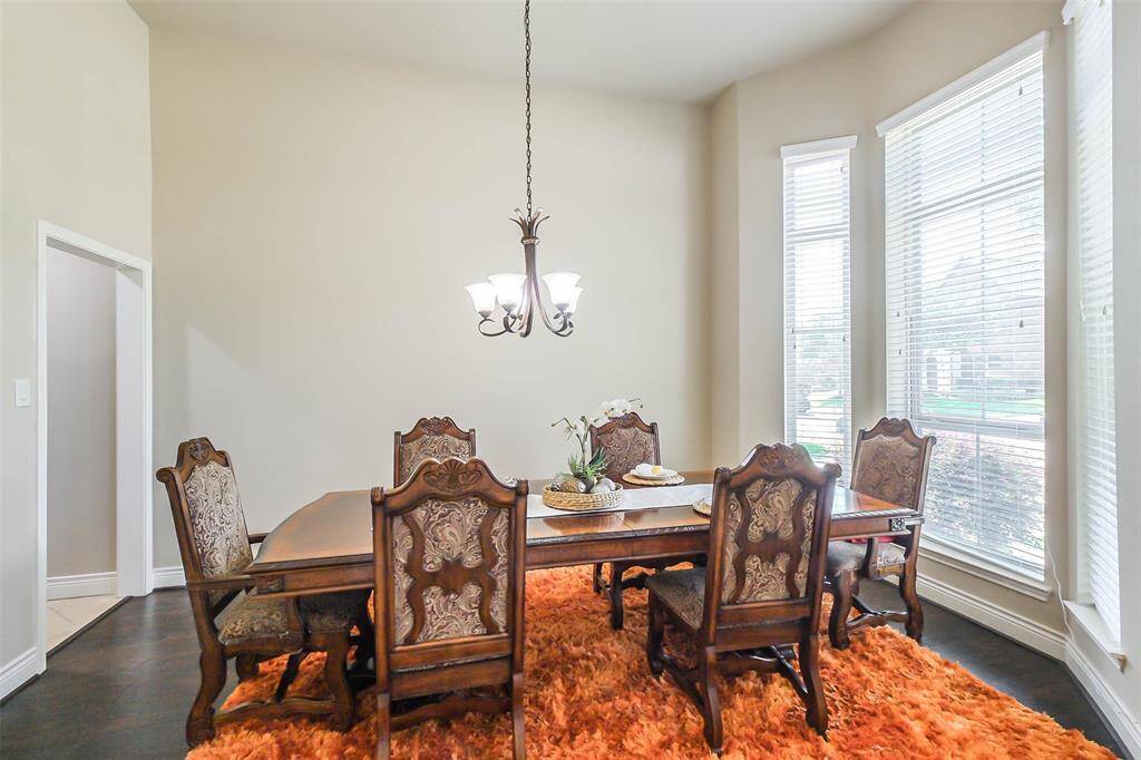 Spacious formal dining with large windows