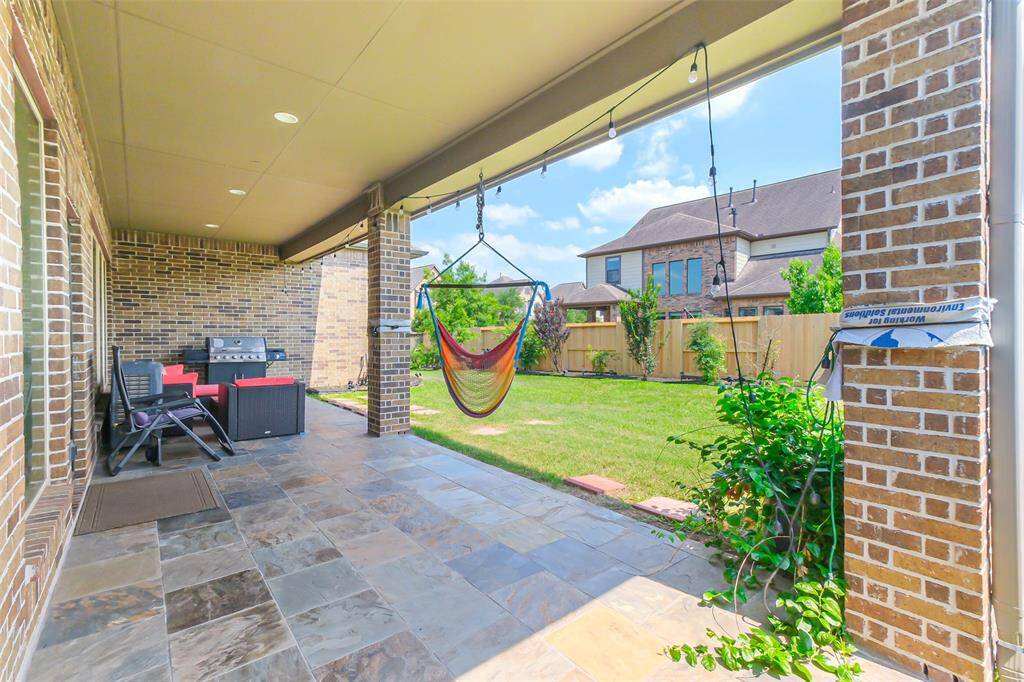 Extended patio with slate flooring
