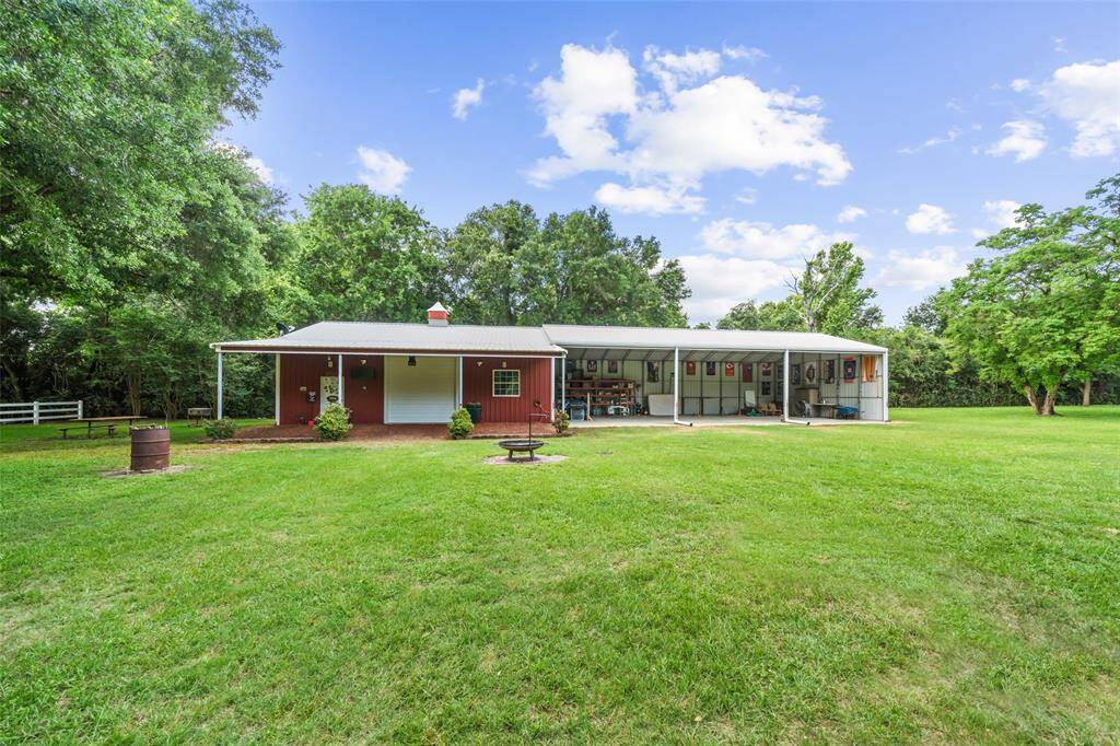 Whether you’re wrenching, building, or throwing the ultimate backyard bash, this 30x40 Hawthorne steel building has you covered—literally. With rolling bay doors, a covered extension, and plenty of open space, it’s perfect for workshops, hobbies, or turning into your own personal party barn.