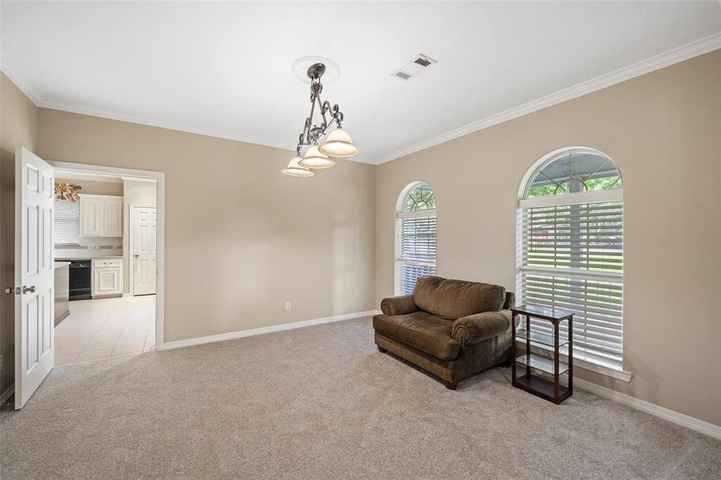 Host lavish dinner parties or small casual gatherings in this intimate formal dining room with plenty of room for your banquet table and sideboard. Your friends and family are going to love breaking bread with you in this gorgeous space.