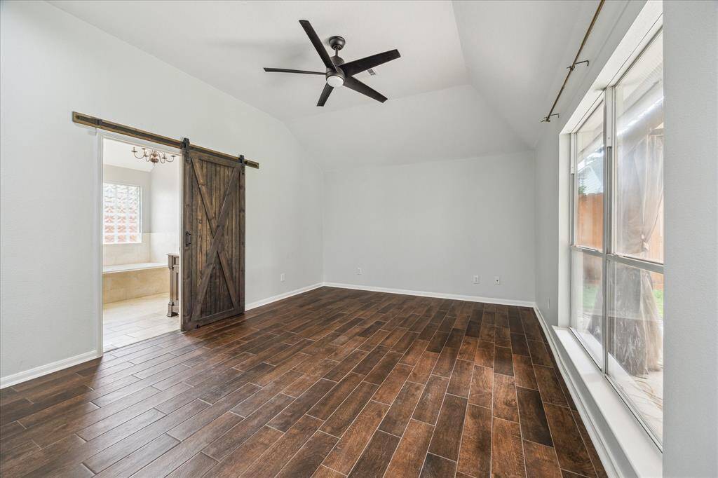 Barn door for the primary on-suite bath