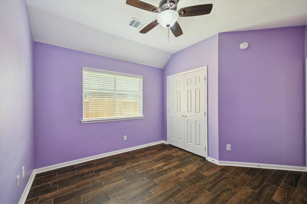 Secondary bedroom with  closet