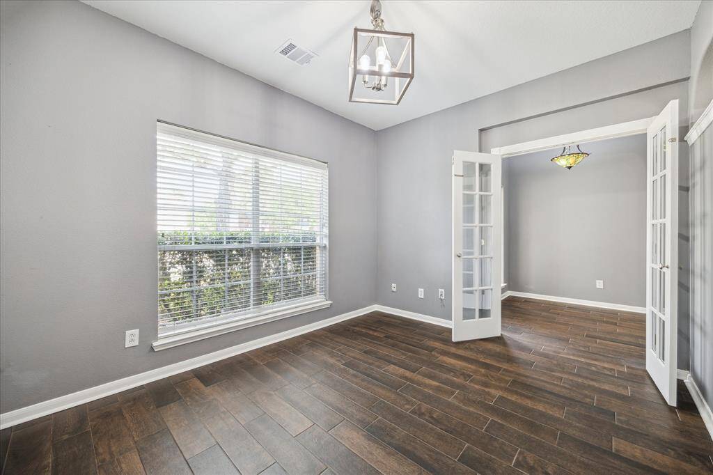 Double Windows Enhance This Formal Dining Space