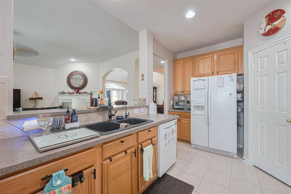 The matching black faucet and premium bosch appliances blend style and performance