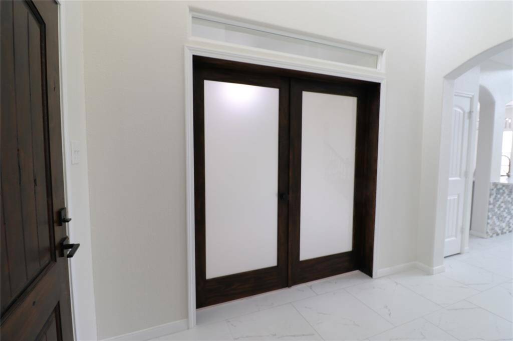 French doors to private office.
