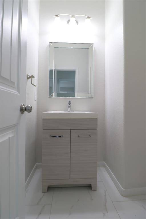 Half bath off the living room.