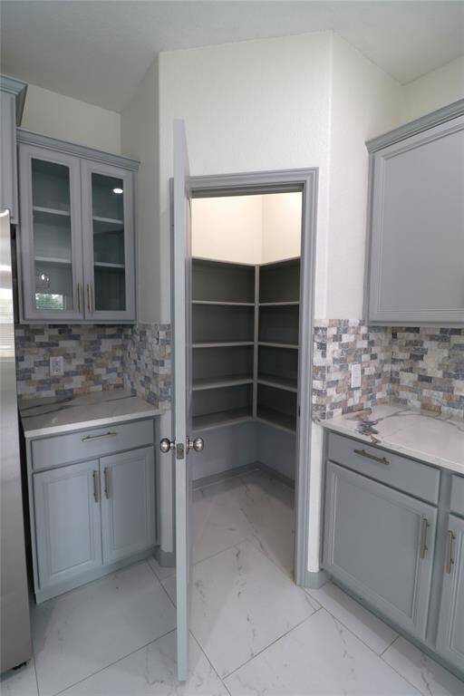 Walk-in pantry and coffee area.