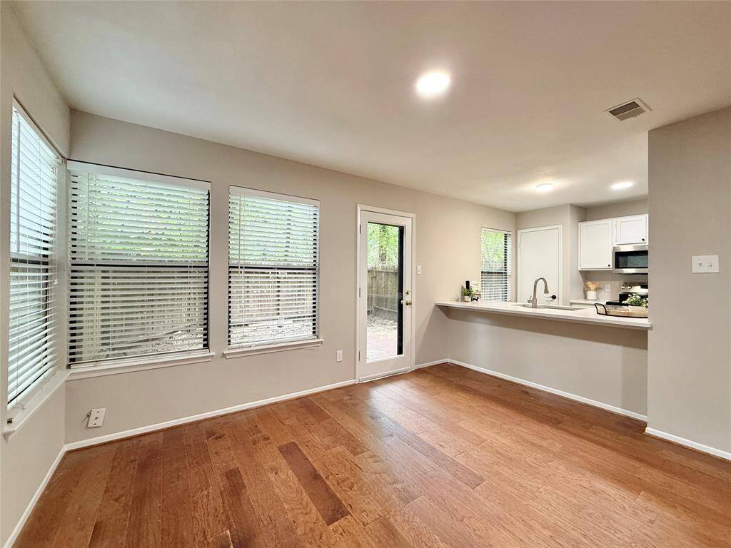 Easy access to the cute back patio & yard