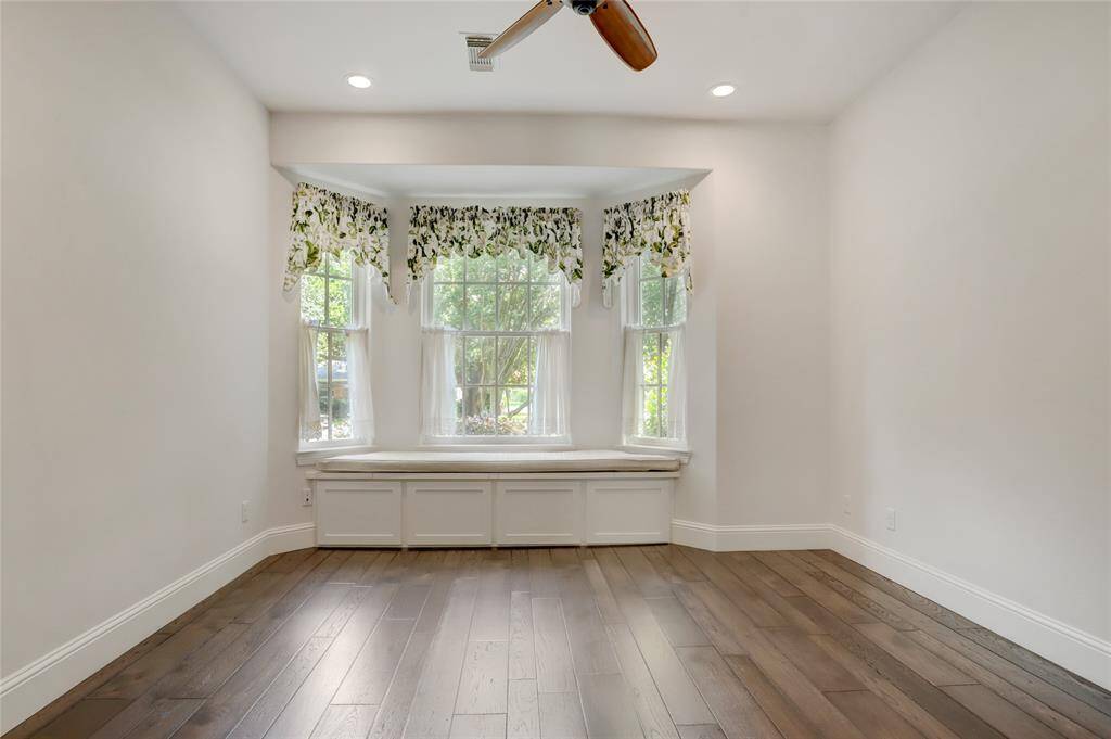 Downstairs bedroom with window seat - full bathroom is located across the hall