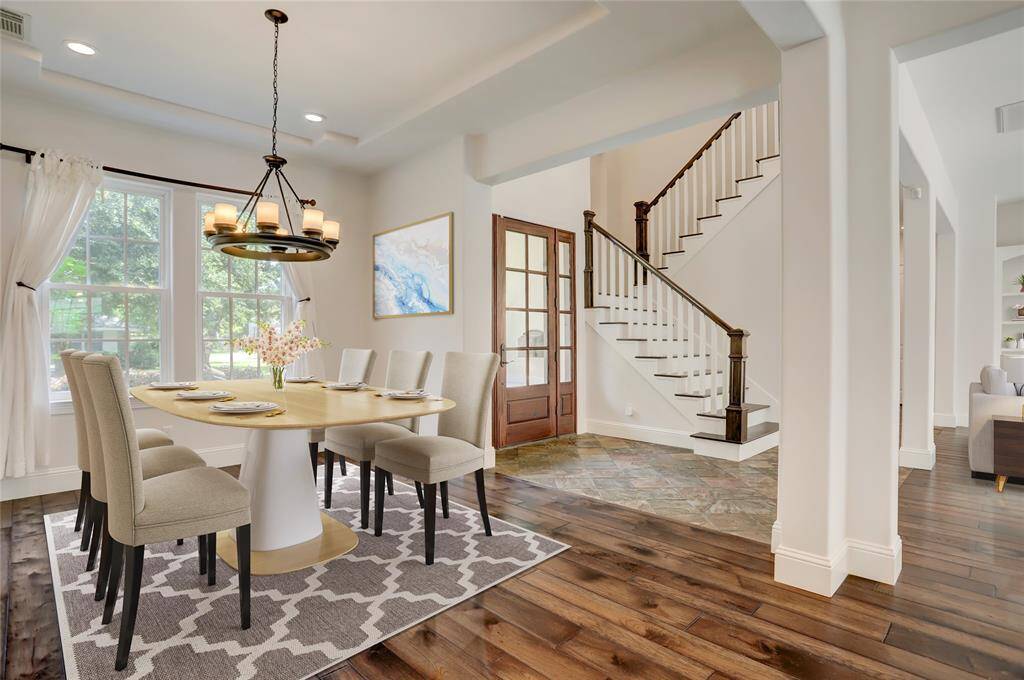 Light and bright virtually staged dining room