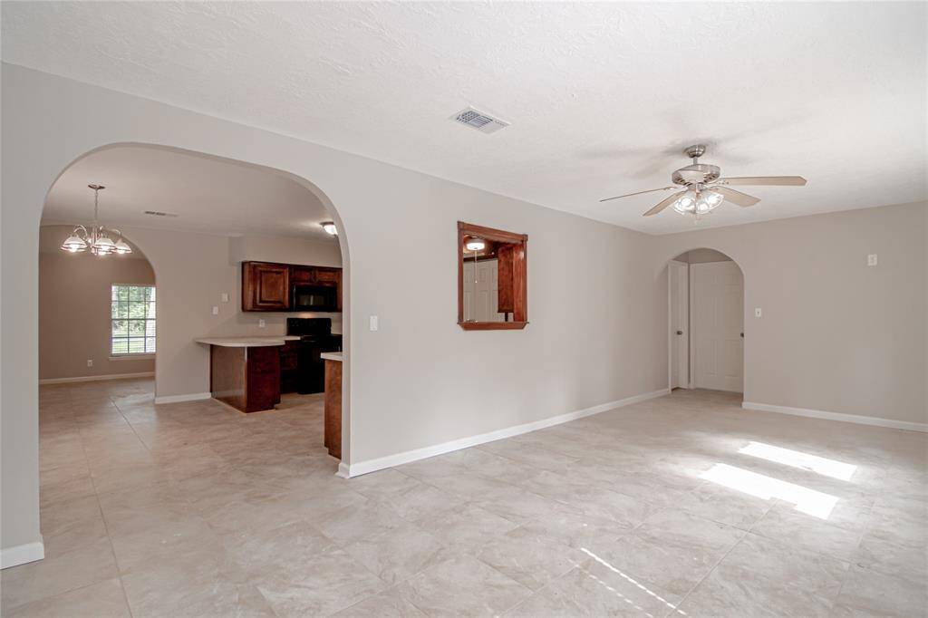 Bonus room looking to the kitchen.
