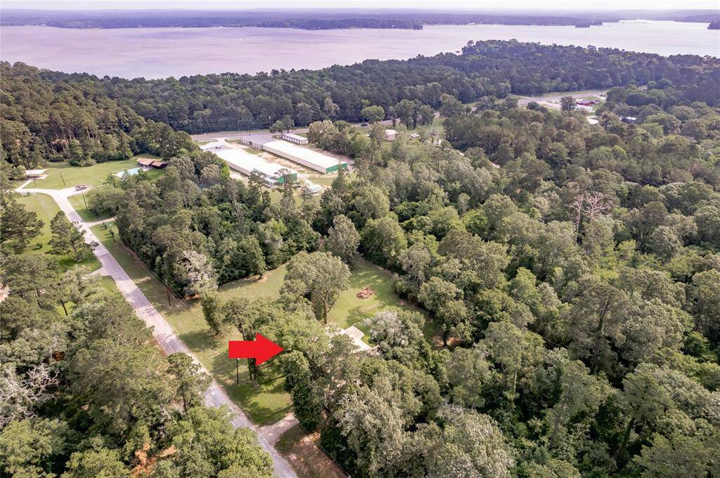 Ariel view of the home and how close the water is.