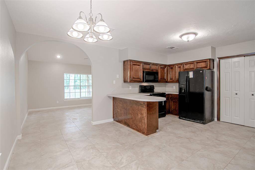 View of the kitchen and breakfast area.