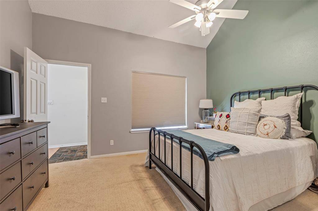 Conveniently located just steps from the main entrance, this cozy bedroom offers immediate comfort upon entry.