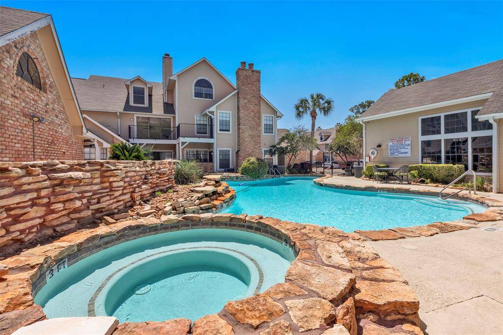 Relax in the jacuzzi nestled at the corner of the pristine swimming pool, offering the perfect blend of leisure and luxury.