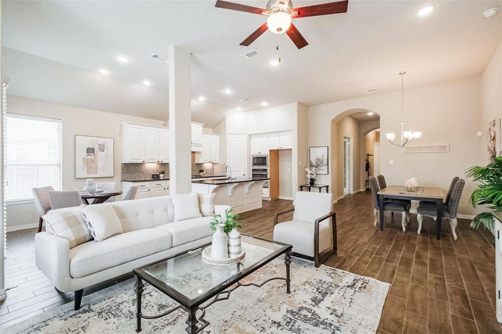 Open concept living with tallceilings is light and bright!
