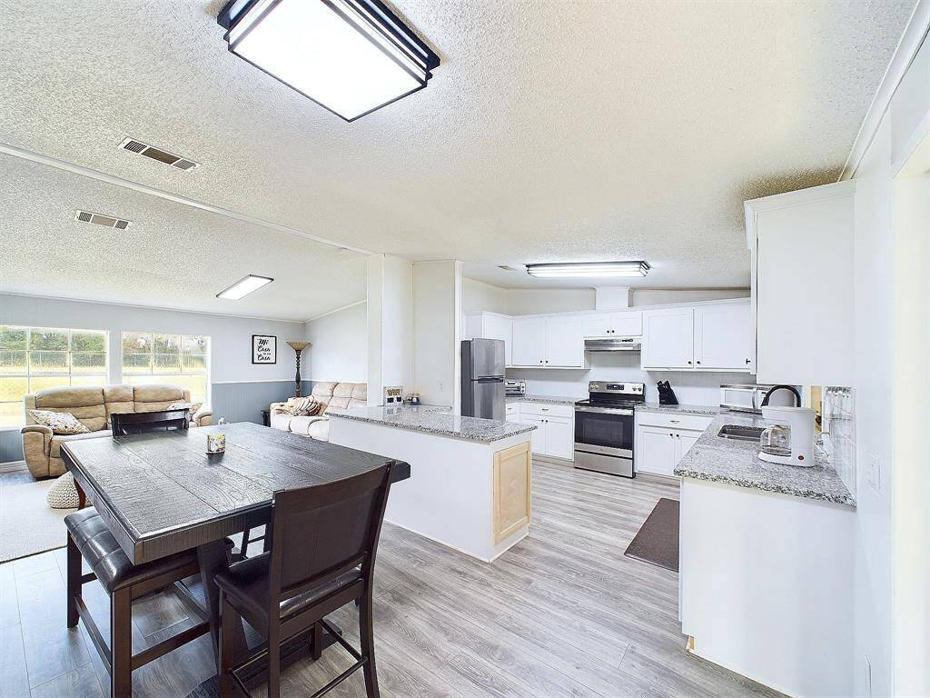 Dining and Kitchen- New counters and cabinets