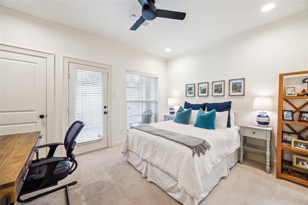 The first floor bedroom has an ensuite bathroom, a large closet and access to the private patio.