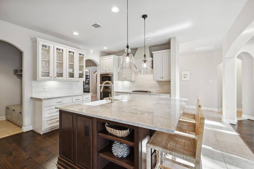 Large island with built-in storage and display