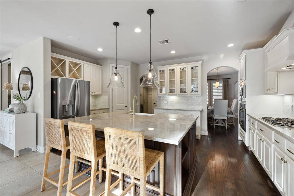 Under cabinet lighting and upgraded cabinet glass