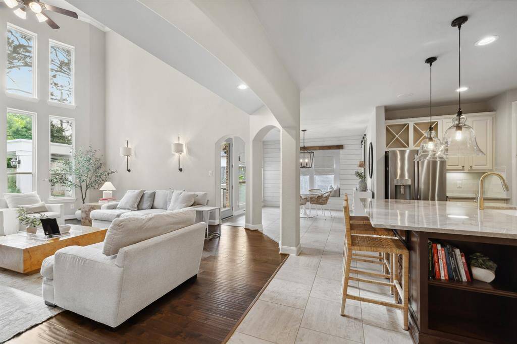 Open floorplan connects the family room, kitchen and breakfast/sunroom for  easy entertaining