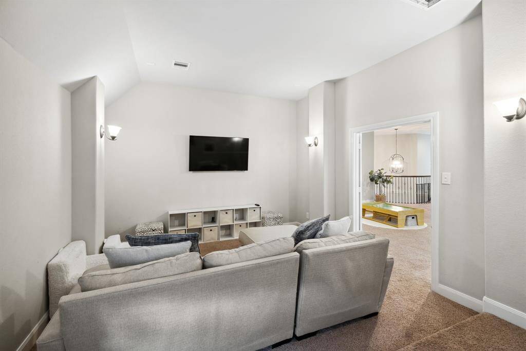 Media room with stadium seating and wired for surround sound