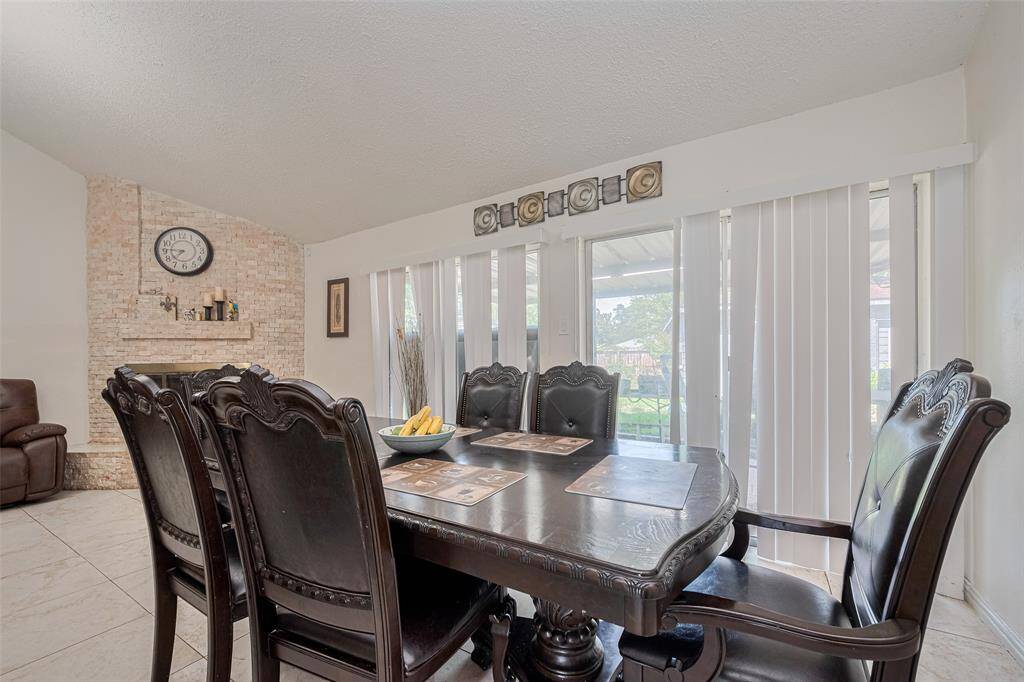 Vaulted high ceilings add an airy feel and enhance the open flow of the living space.