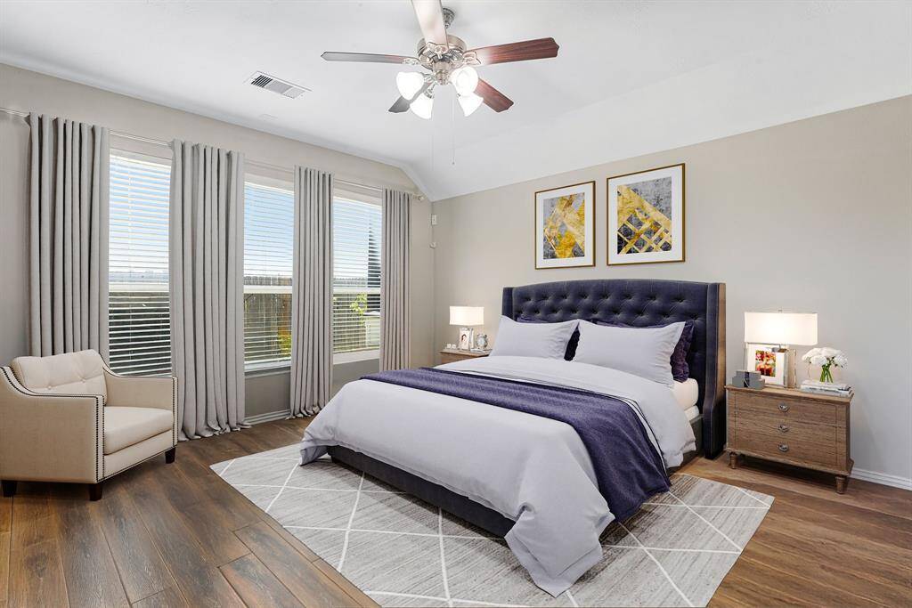 What a wonderful place to come home to, this stunning primary suite greets you with gorgeous wood style floors, a warm custom paint, high ceiling, ceiling fan with lighting, lovely windows with blinds allowing in natural light brightening up this spacious primary bedroom, with extra space for a seating area. *Virtually Staged