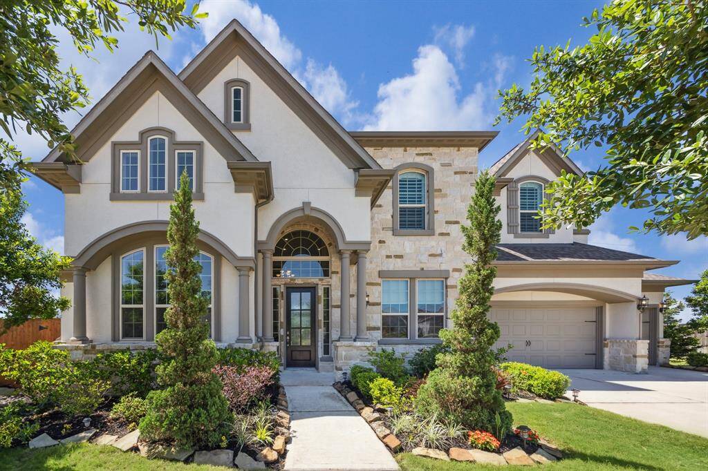 Blending sophistication with thoughtful design, this stunning Taylor Morrison home is nestled in a sought-after gated community. Lightly lived in and upgraded throughout, it captivates from the moment you arrive. With meticulously curated landscaping and a grand entrance, this residence offers both serenity and elegance—an inviting retreat to call home.