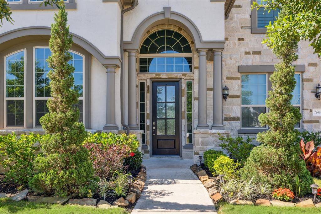 From the designer select natural stone, to the presence of the regal columns, the entrance to this stately home is a stunner! Beyond the customized and upgraded 8' knotty alder wood entrance door with privacy glass, a grand foyer awaits!