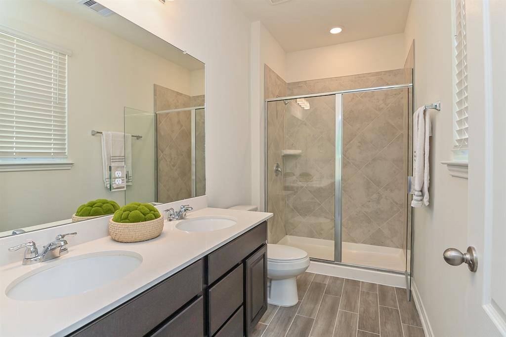 PRIMARY BATH w/ DOUBLE VANITIES, WALK-IN SHOWER IN LIEU OF TUB (UPGRADE)
