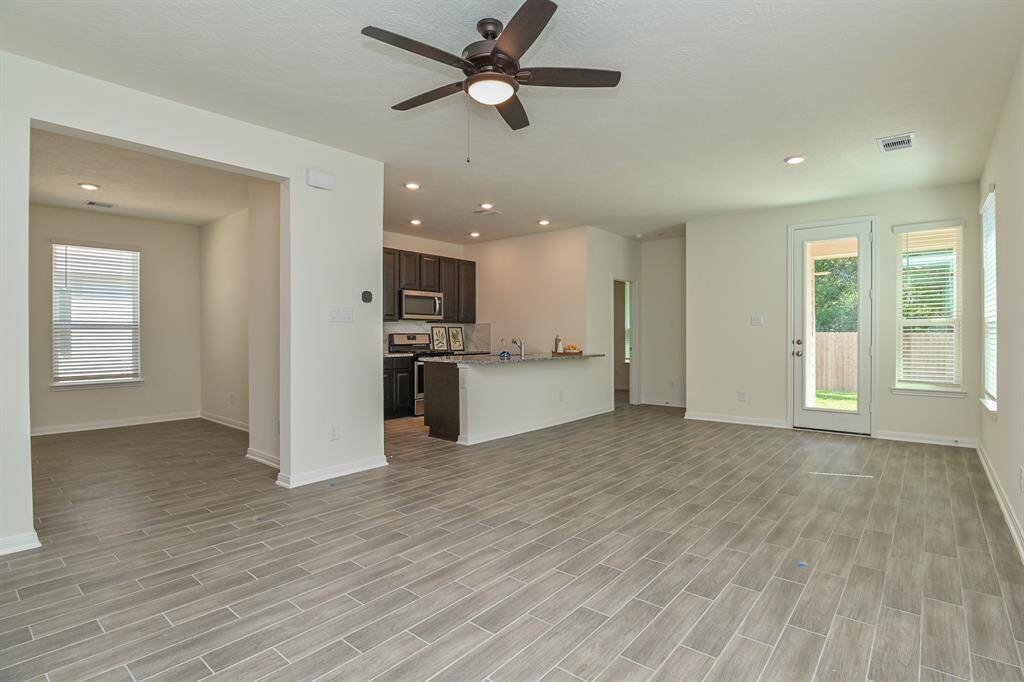 BRIGHT, OPEN, & AIRY LIVING ROOM AND DINING COMBO!