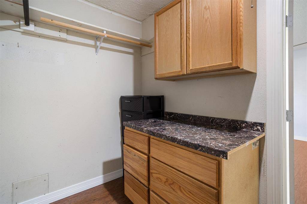 Primary closet with built in storage space