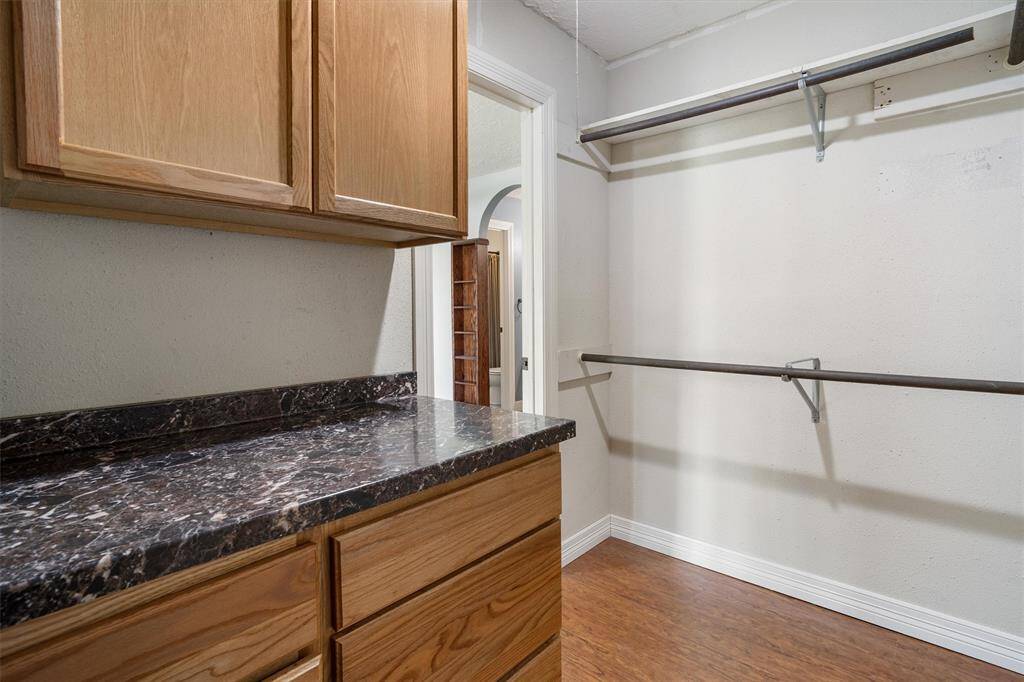 Primary closet with built in storage