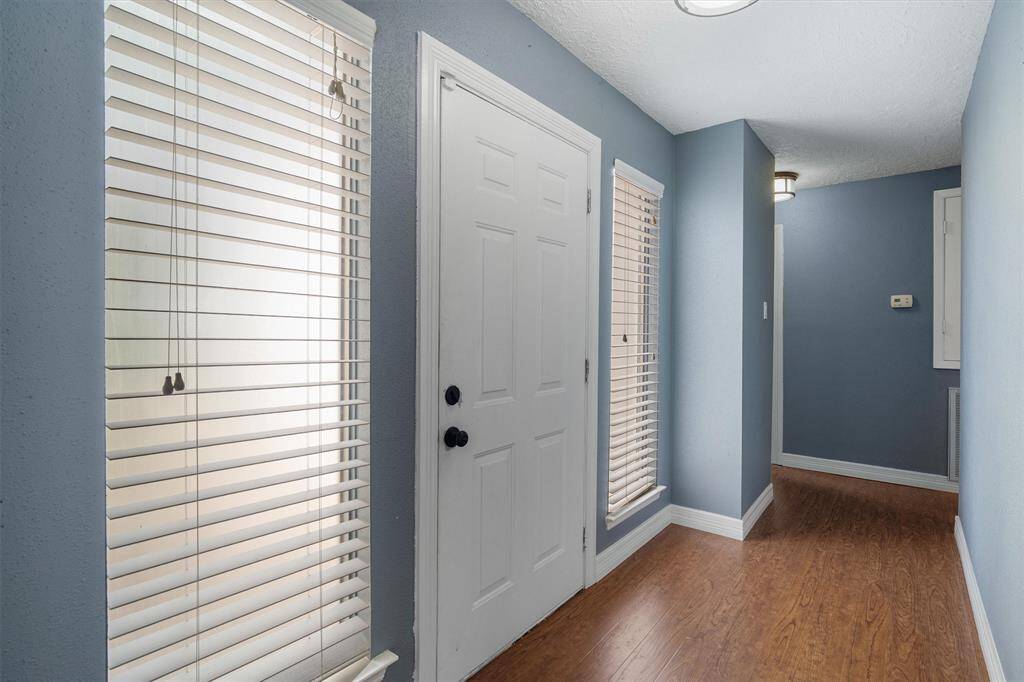 Fresh paint and laminate flooring throughout