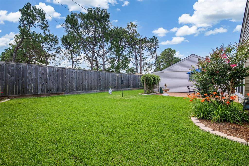 There is plenty of green space for the kids and pets to play. The 8" fence was replaced in 2022.