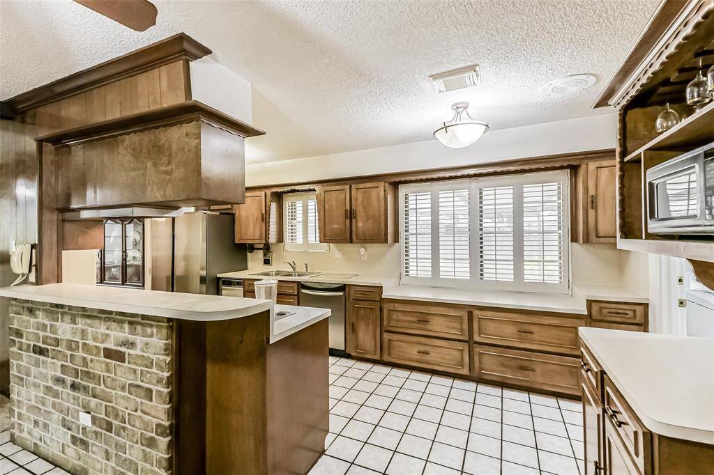 kitchen with view onto covered carport