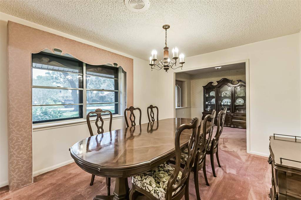 dining room with view into breakfast and front of home