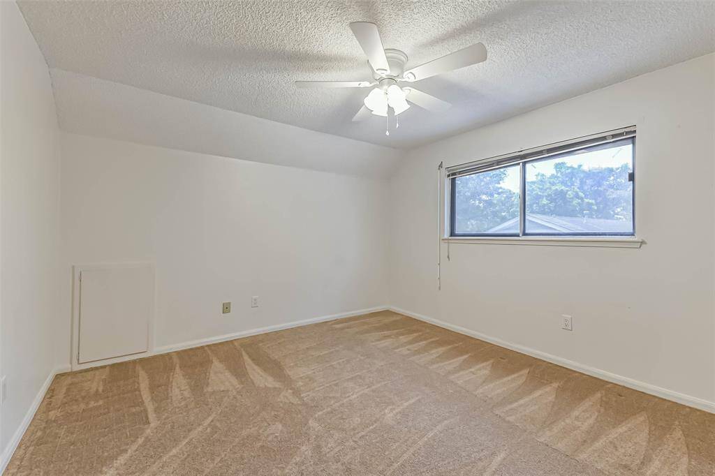 secondary bedroom opposite side of stairs