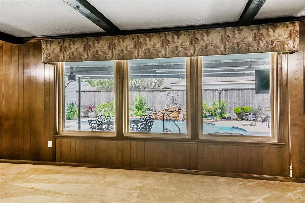 view directly to backyard oasis from living room