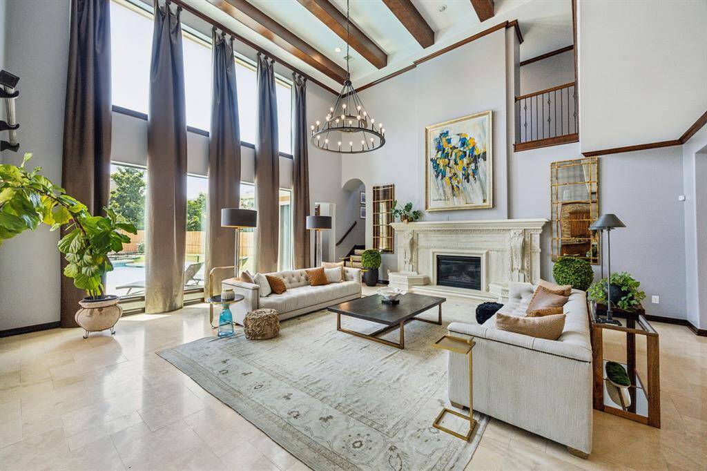Embrace luxury in this elegant living space perfect for both relaxation and entertaining. With expansive windows overlooking stunning outdoor views, this home seamlessly blends indoor comfort with outdoor splendor. High-end finishes and impeccable details make every moment feel extraordinary.