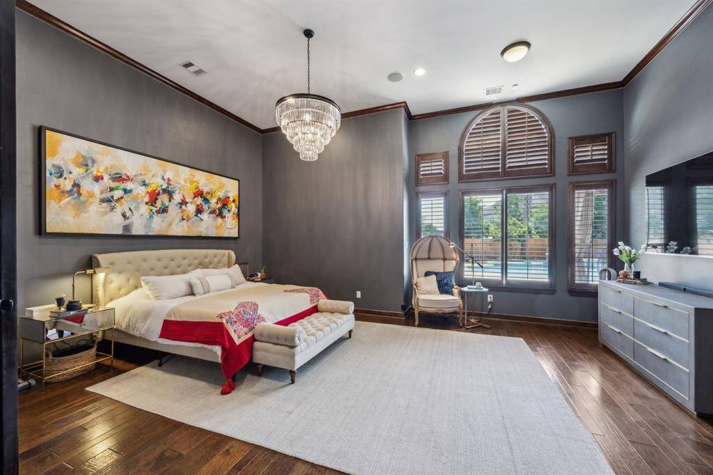 The dream home office is where elegance meets practicality! Admire the ample natural light. The Space afforded accommodates furniture pieces of your choice. The wood floors and the Plantation Shutters are the perfect finishing touch.